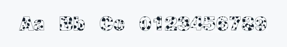 Rzeczywista próbka kroju Cow-Spots — Aa Bb Cc 0123456789