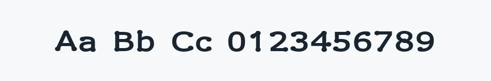 Rzeczywista próbka kroju Drummon — Aa Bb Cc 0123456789